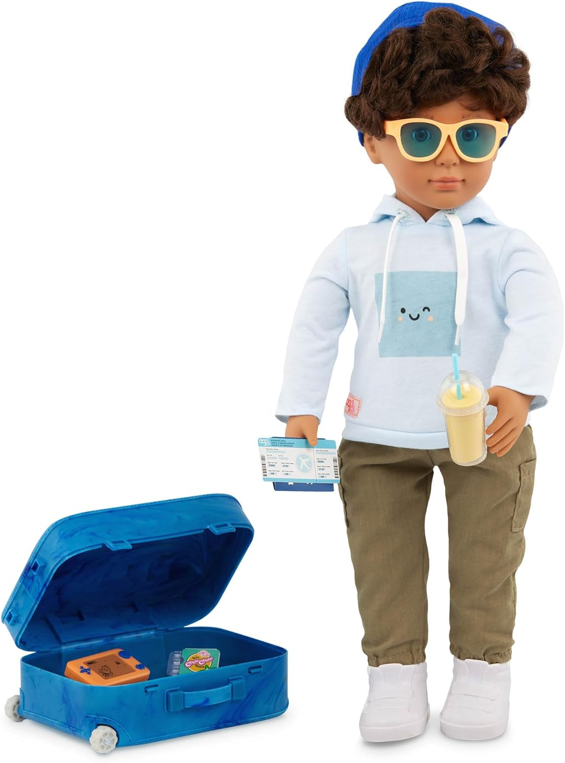 Our Generation - Milo - Bambola ragazzo da 46 cm - Occhi castani realistici e capelli castani ricci - Valigia con ruote e accessori da viaggio - Gioco di finzione - Giocattolo dai 3 anni in su
