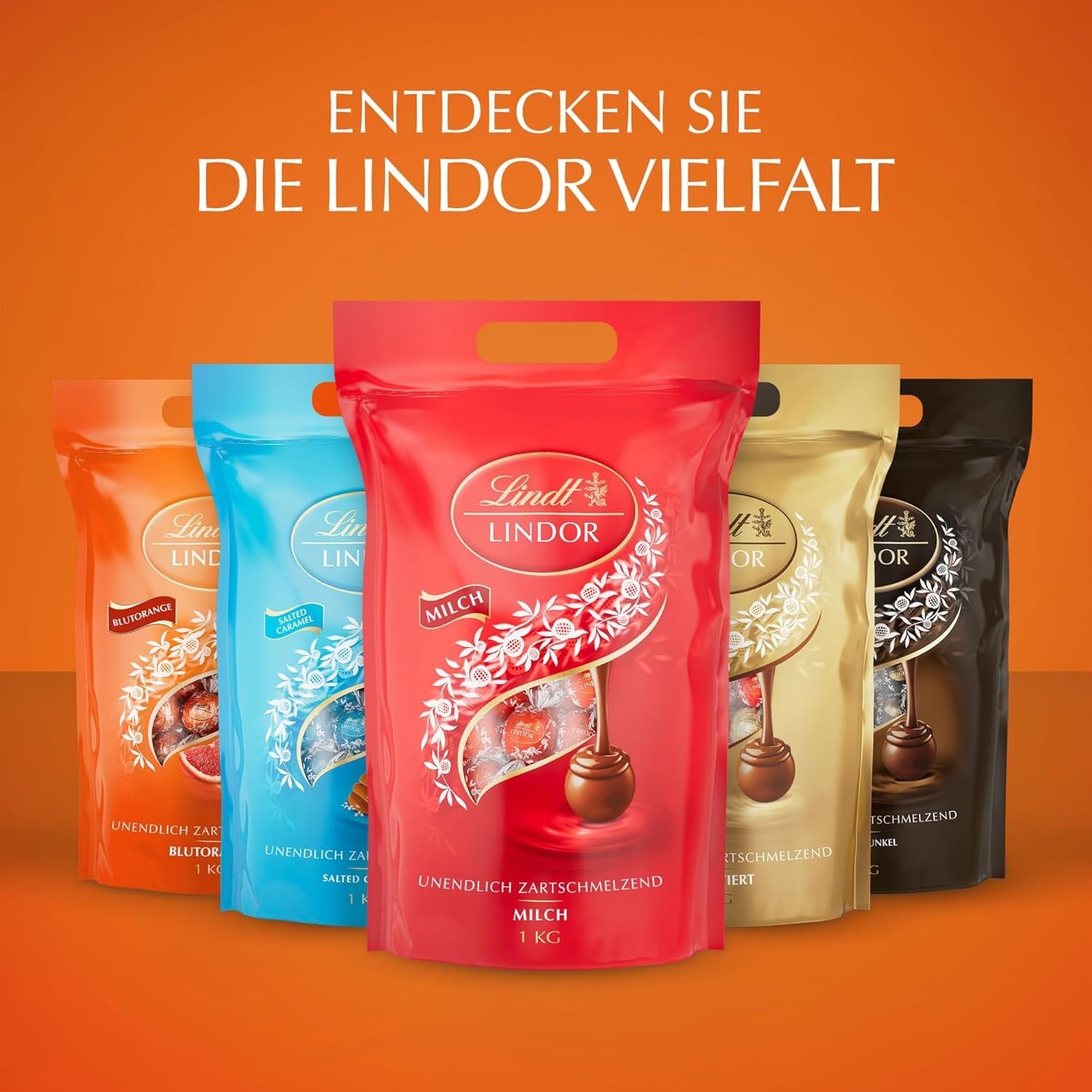 Lindt LINDOR Palline di cioccolato all'arancia rossa | Busta richiudibile da 1 kg | ca. 80 cioccolatini con ripieno scioglievole in bocca | Confezione sfusa, regalo di cioccolato