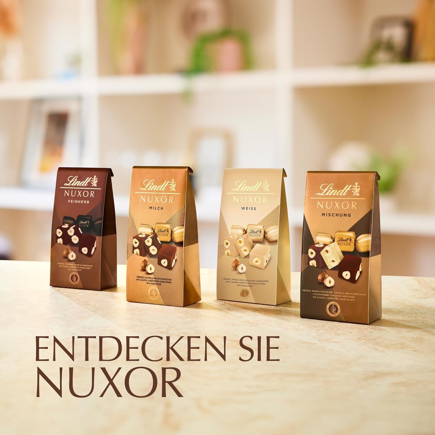 Cioccolata Lindt | Miscela per borsa NUXOR | 103g| Cubi Cremosi di Cioccolato Gianduja in Tre Assortimenti con Nocciole Intere Tostate | Regalo di cioccolato