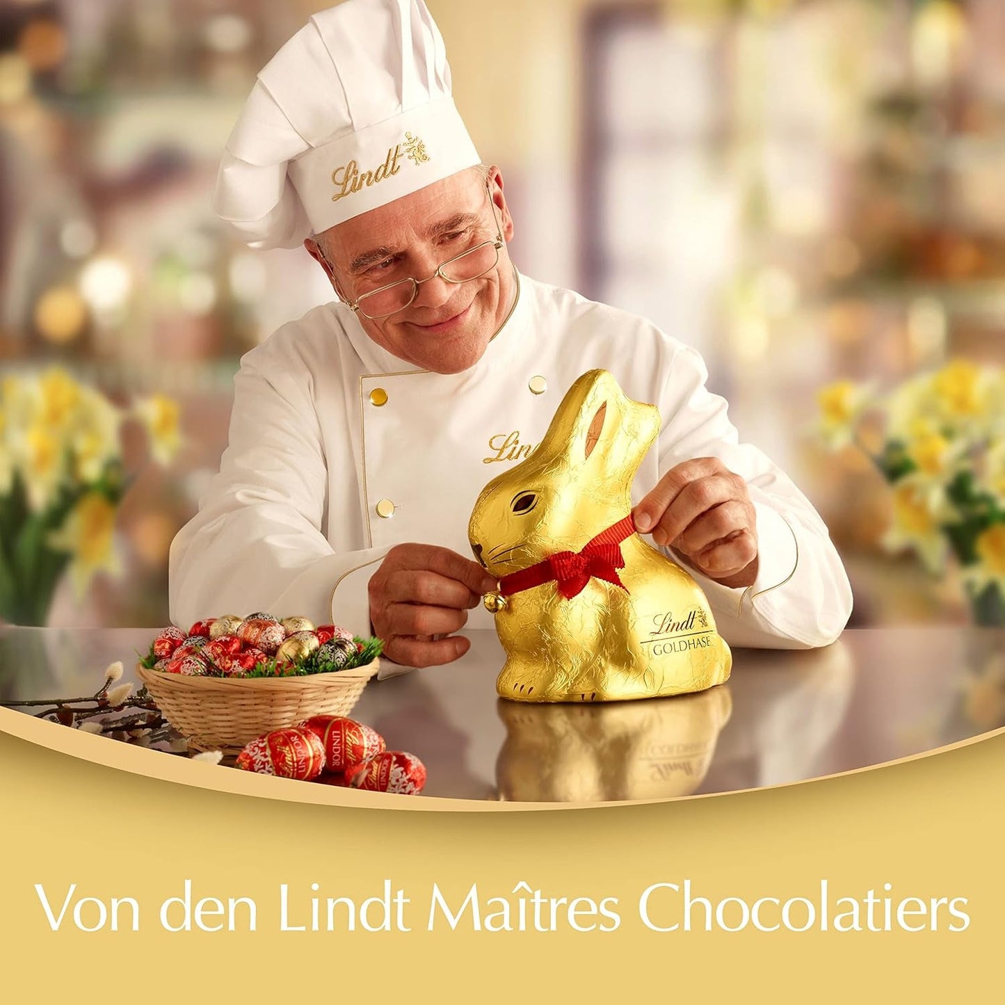 Nido di Pasqua colorato al cioccolato Lindt | 310 g| 8 mini coniglietti dorati, 26 uova di cioccolato al latte Lindor, 15 uova di cioccolato bianco Lindor, 10 uova di cioccolato fondente Lindor | Cioccolato pasquale | Dono di cioccolato