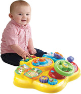 VTech Baby Adventure Play Table - Tavolo da gioco colorato per neonati con 6 campi da gioco ed elementi interattivi e Baby My First Song Book Libro colorato da 6 pagine ed elementi mobili per il gioco Bebe Toys Naty Shop
