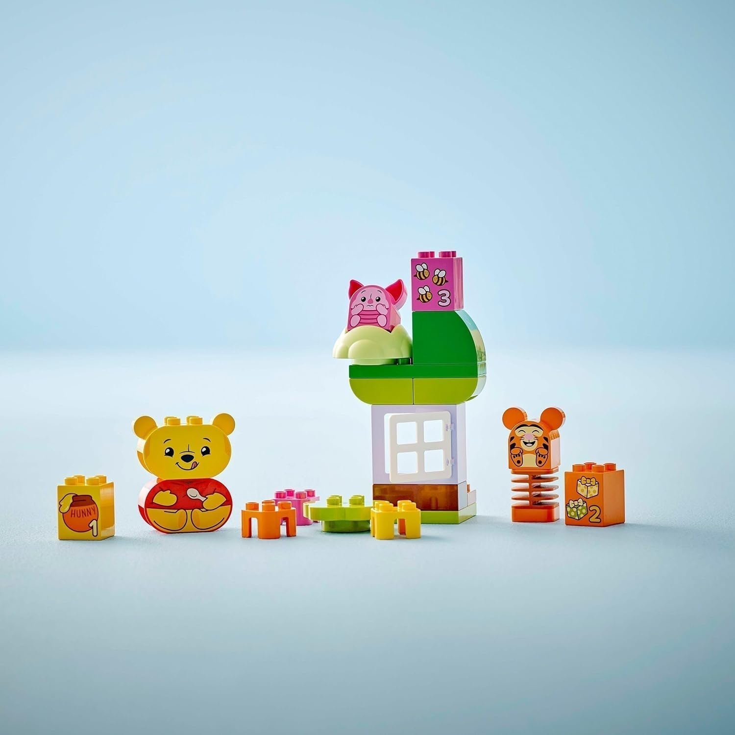 LEGO DUPLO - Disney Winnie the Pooh's Birthday Party - giocattolo educativo per bambini in età prescolare - set di 3 minifigure tra cui Winnie the Pooh, Tigro e Maialino - idea regalo per ragazzi e ragazze da 1,5 anni 10457 Beuche set da costruzione den LEGO-Store