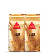 Delta Cafés - Kaffeebohnen Gold - 2 pacchetti da 1 kg - Intensità 12 - Vollmundige Arabica-Röstkaffebohnenmischung - Sehr aromaticisch mit Noten von Honig und Reifen Früchten