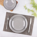 Set di stoviglie in gres da 6 porzioni Amazon Basics da 18 pezzi Smoky Grey