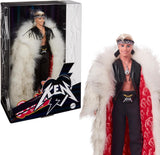 Barbie The Movie, bambola Ken da collezione che indossa un grande cappotto in pelliccia sintetica e un gilet con frange nere con bandana, HRF31