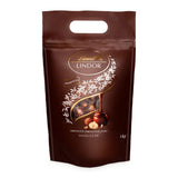 Palline di cioccolato LINDOR con nocciole, sacchetto da 1 kg + botte di Sherry Johnnie Walker da 0,7 litri