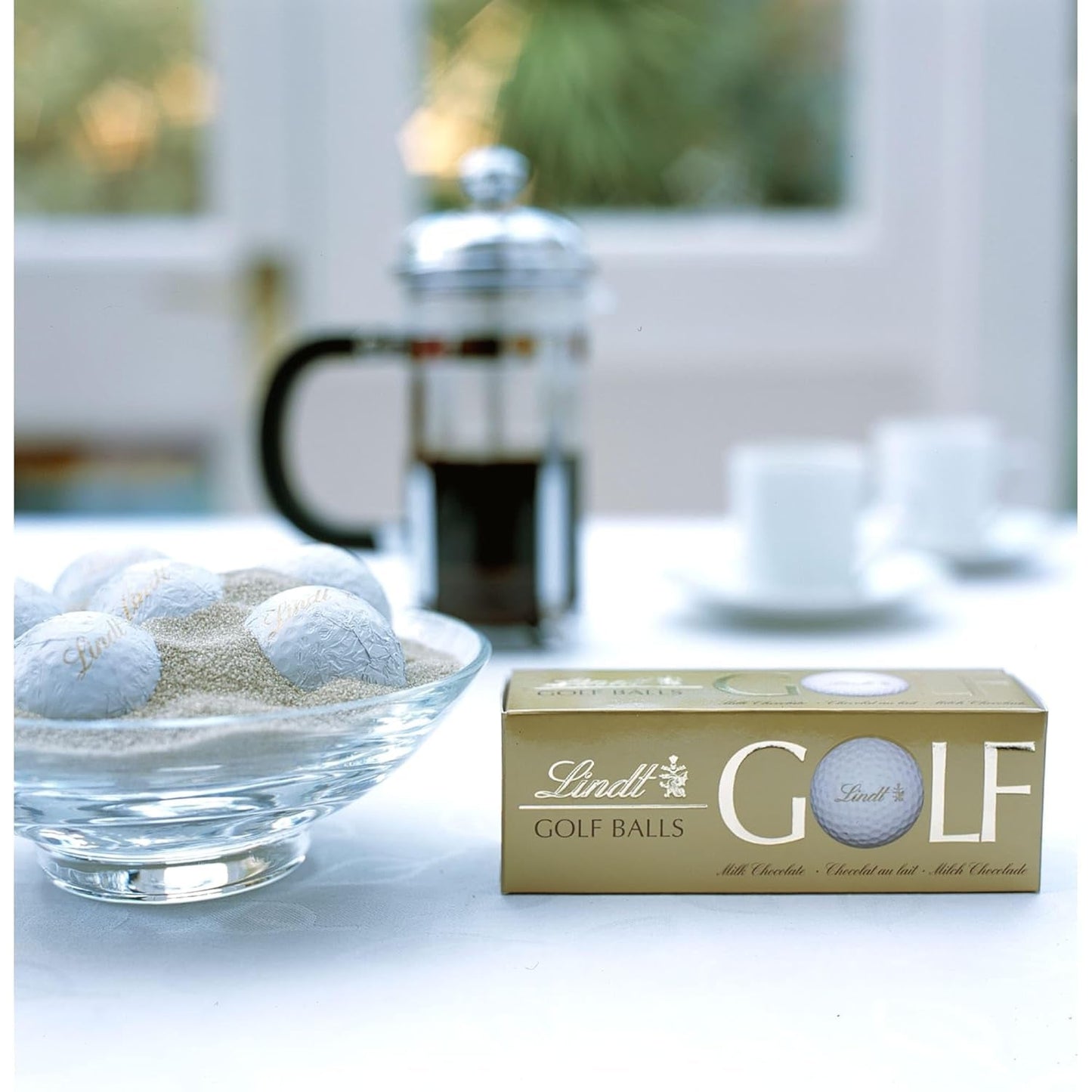 Lindt Schokolade - Palline da golf | 110G| Tre palline da golf Aus Lindt Vollmilch-Schokolade Mit Nougatcremefüllung und Waffelstückchen | Pralinengeschenk | Regalo per golfista | Schokoladengeschenk Naty Shop