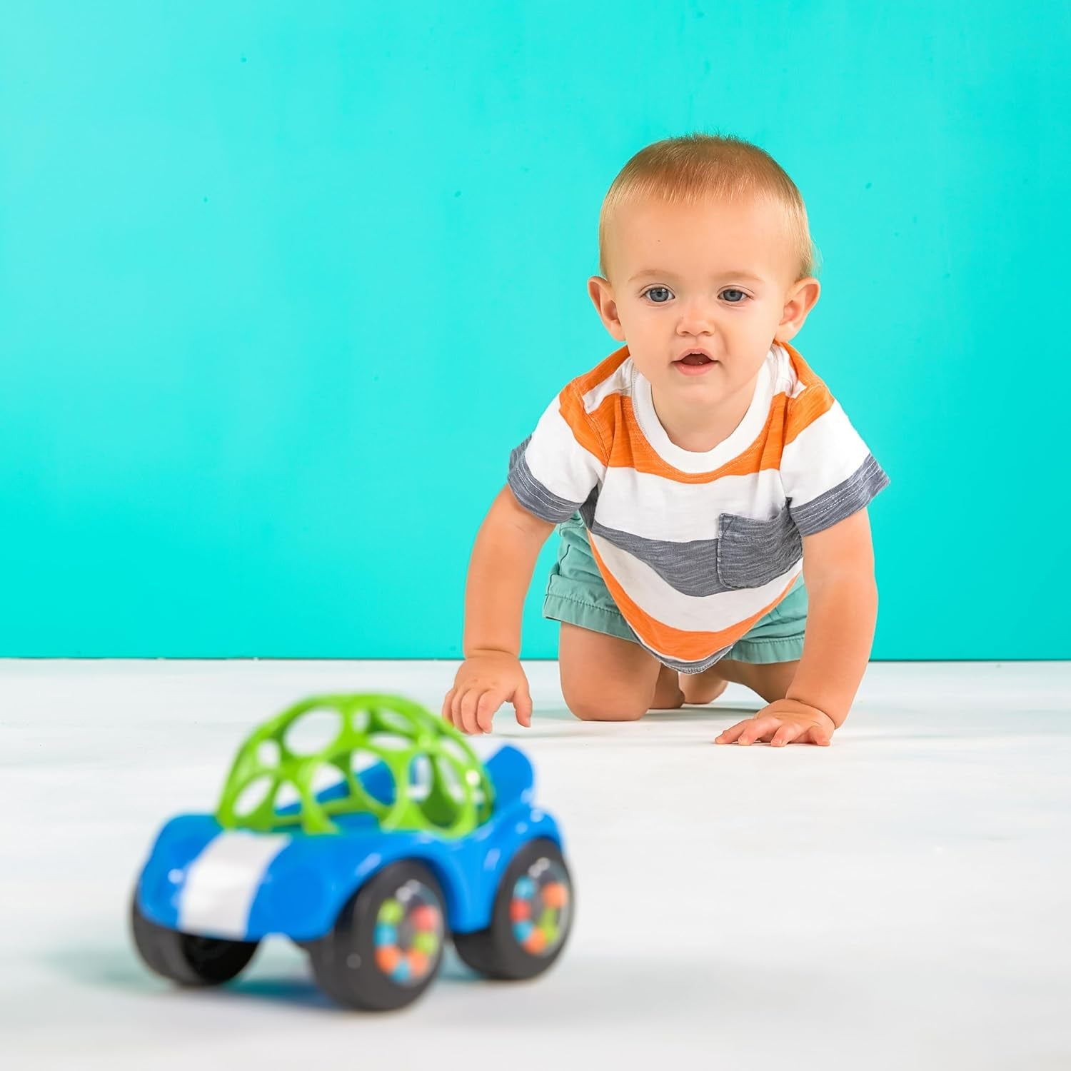 Bright Starts, Oball, Macchinina con sonaglio, Giocattoli per bambini verde-blu Naty Shop