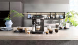 De'Longhi Magnifica Evo Next - Perfetto Espressore completamente automatico con montalatte LatteCrema, 13 bevande one-touch, macchina per caffè e cappuccino, touch screen a colori, titanio (ECAM312.80.TB)