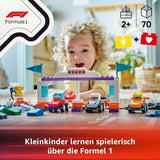 Auto da corsa del team F1 LEGO DUPLO Town con piloti, giocattolo da costruzione per tutta la famiglia, esperienza di gioco fantasiosa, regalo di compleanno per bambini, ragazzi e ragazze a partire da 2 anni 10445 Set da costruzione Besuche den LEGO-Store