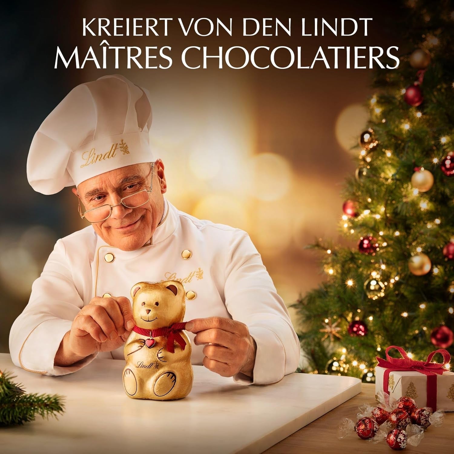 Cioccolata Lindt | Scatola di praline in pezzi d'oro | 180 g| 18 praline in 10 assortimenti come pregiato assortimento di praline, alcune con alcol | Confezione regalo premium con praline natalizie