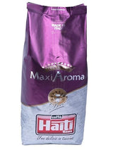 Caffè Haiti Roma Maxi Aroma in confezione da 1 kg. Miscela equilibrata, tostatura artigianale, made in Italy.
