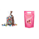 Preparato al cioccolato LINDOR | 1371 gr | ca. 109 palline: Cioccolato al latte e palline LINDOR con crema alla fragola | sacco da 1 kg, ca. 80 palline di cioccolato bianco con crema alla fragola