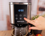 Macchina per caffè espresso con filtro Rommelsbacher FKM 1000 - serbatoio dell'acqua da 1,5 litri per 12 tazze di caffè, caraffa in vetro, avvio ritardato, funzione di mantenimento in caldo, funzione aroma, portafiltro rimovibile 1x4