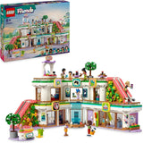 LEGO Friends Heartlake City Store Casa delle bambole giocattolo per ragazze e ragazzi Set di statuette che promuove lo sviluppo socio-emotivo Regalo per bambini di 8 anni 42604 Set da costruzione Besuche den LEGO-Store Single
