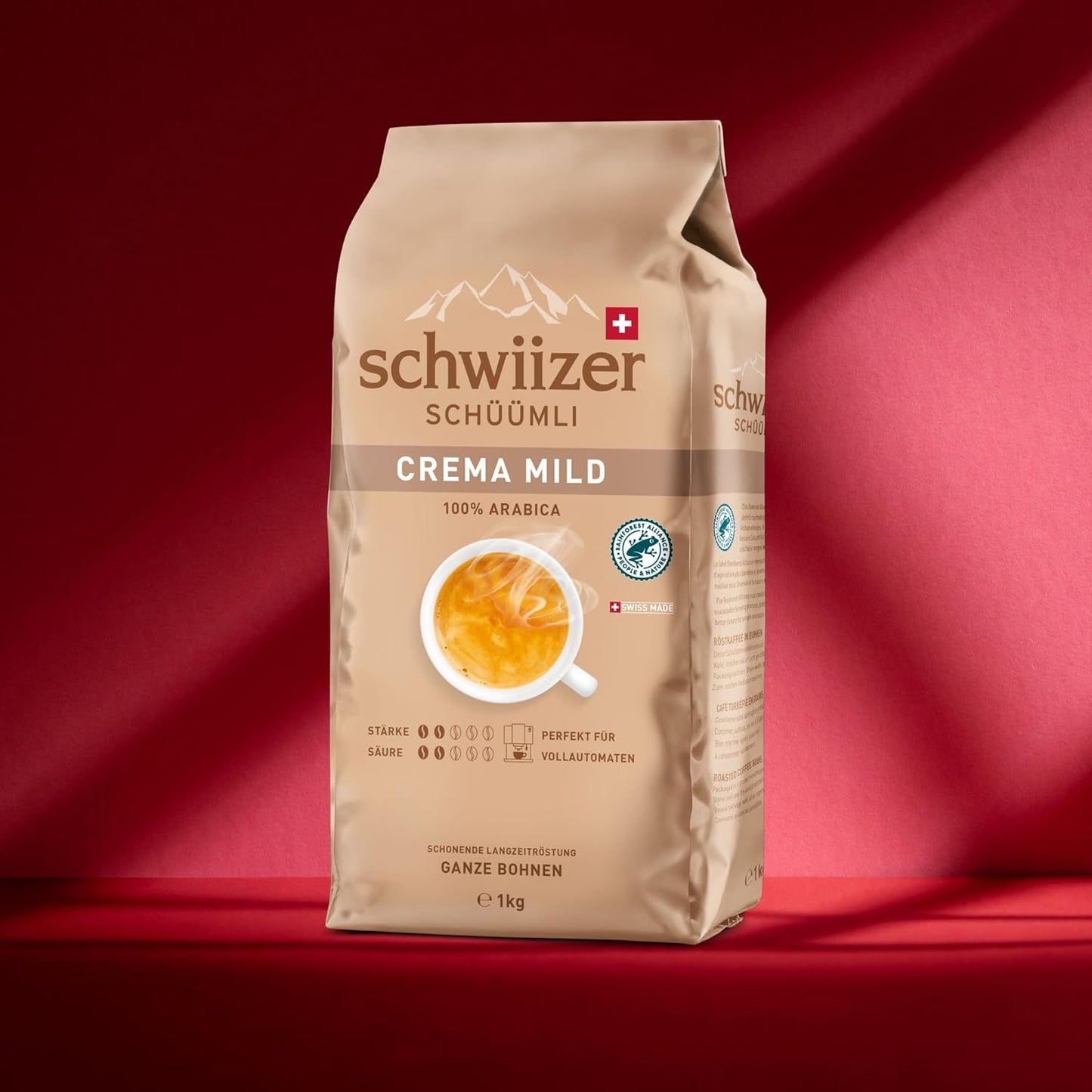 Schwiizer Schüümli Crema Mild, 100% caffè Arabica Premium, fruttato e nocciolato, per macchine da caffè completamente automatiche, forza 2/5, tostatura leggera, certificato Rainforest Alliance, 1 kg (confezione da 2)