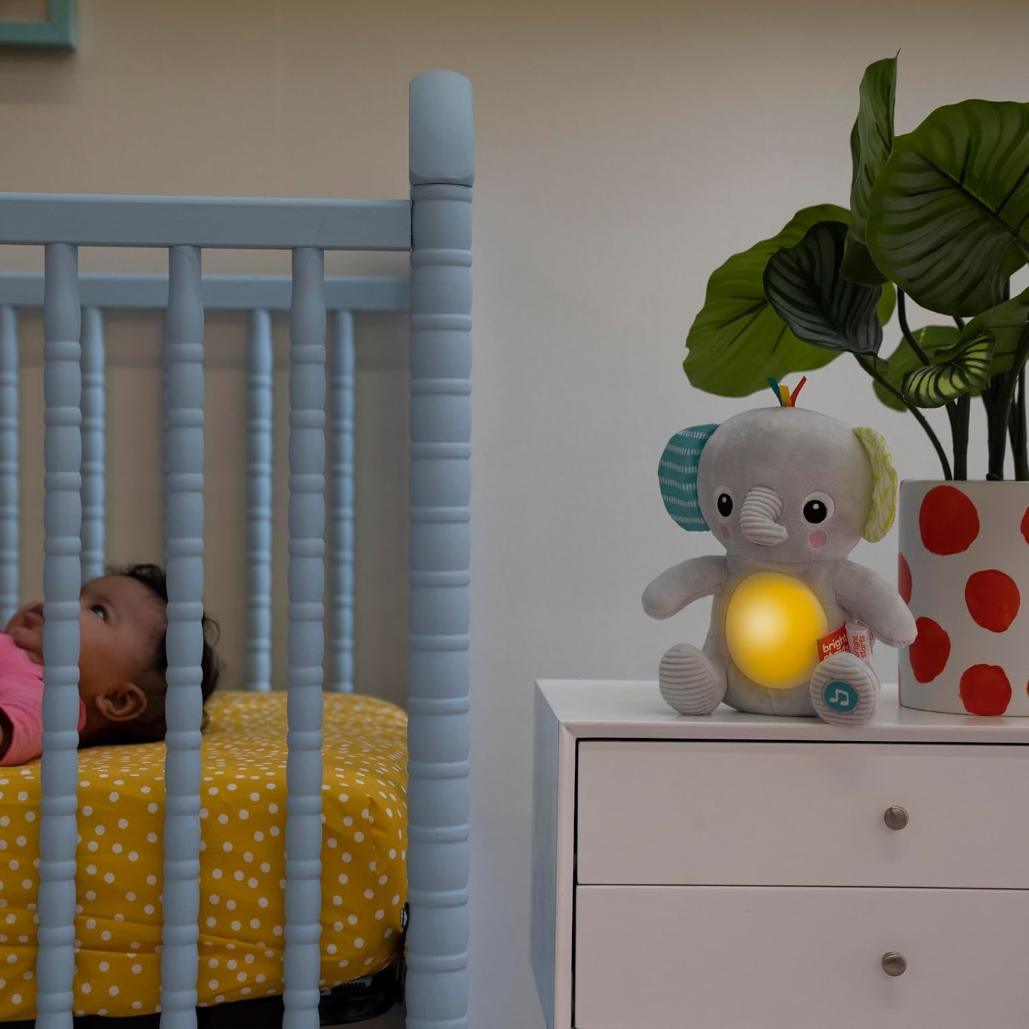 Bright Starts, Elefantino Hug-a-bye con luci, canzoni, texture diverse e altro, multicolore Toys Bebe Naty Shop