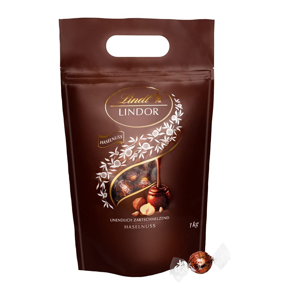 Palline di cioccolato LINDOR con nocciole, sacchetto da 1 kg + botte di Sherry Johnnie Walker da 0,7 litri