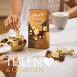 Cioccolata Lindt | Miscela per borsa NUXOR | 103g| Cubi Cremosi di Cioccolato Gianduja in Tre Assortimenti con Nocciole Intere Tostate | Regalo di cioccolato