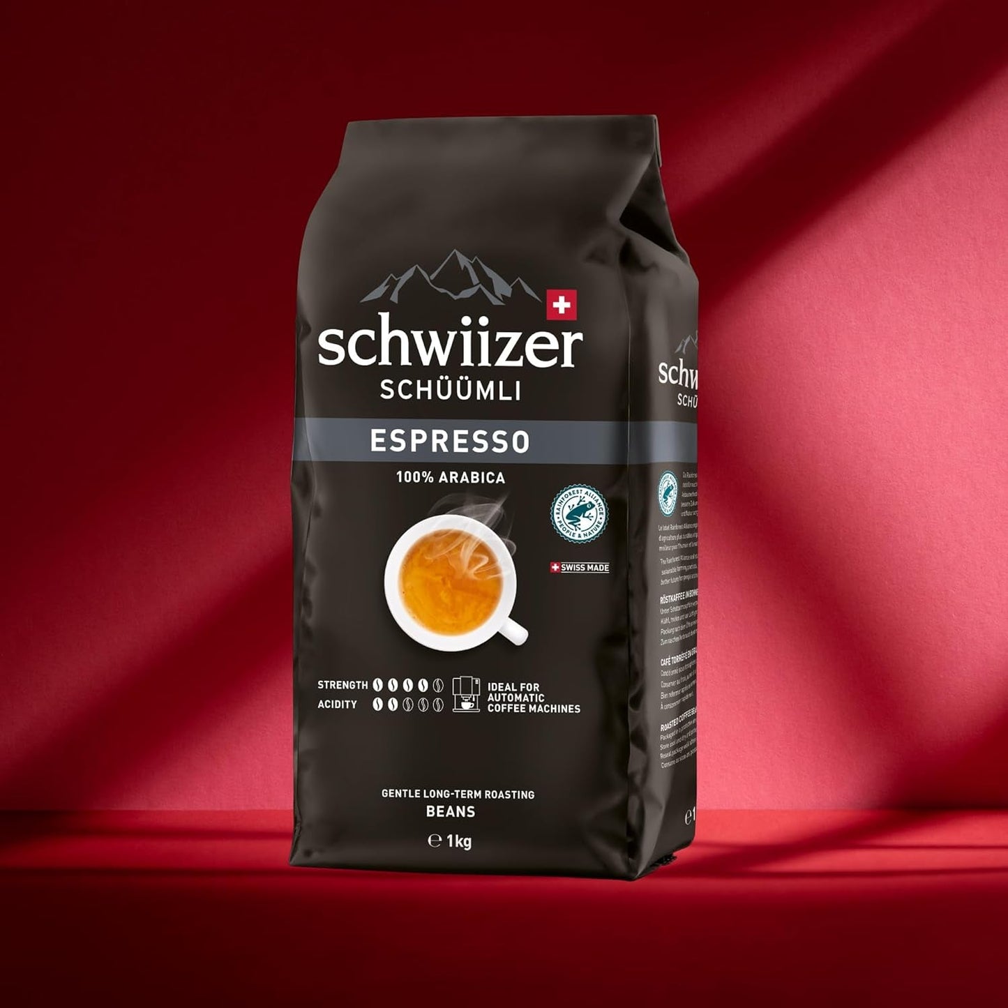 Schwiizer Schüümli Espresso, caffè in grani 100% Arabica, forte e intenso, ideale per macchine espresso automatiche, forza 4/5, tostatura media, Rainforest Alliance, 1kg
