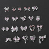 Luxus Rosa Diamant Nagel Charms Farfalla 3D Nail Art Charms Arco Nail Charms Y2K Cuore Charms Nägel Zubehör Schmetterling Herz Schleife Nageldesign Edelsteine ​​​​Strasssteine ​​​​Glitzersteine ​​​​Nagelschmuck