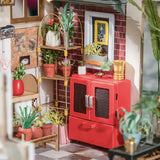 Robotime DG145 Rolife Emily's Flower Shop Casa delle bambole in miniatura Realizzata in legno, metallo, tessuto e cartone, Dimensioni: 22 X 15 X 17 cm, Case delle bambole Naty Shop