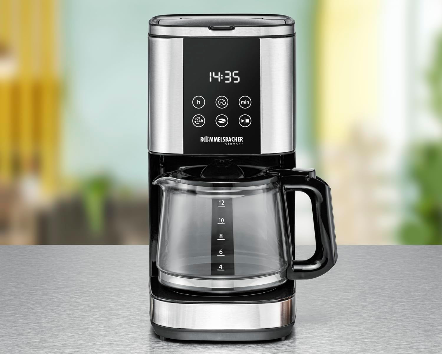 Macchina per caffè espresso con filtro Rommelsbacher FKM 1000 - serbatoio dell'acqua da 1,5 litri per 12 tazze di caffè, caraffa in vetro, avvio ritardato, funzione di mantenimento in caldo, funzione aroma, portafiltro rimovibile 1x4