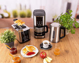 Macchina per caffè espresso con filtro Rommelsbacher FKM 1000 - serbatoio dell'acqua da 1,5 litri per 12 tazze di caffè, caraffa in vetro, avvio ritardato, funzione di mantenimento in caldo, funzione aroma, portafiltro rimovibile 1x4
