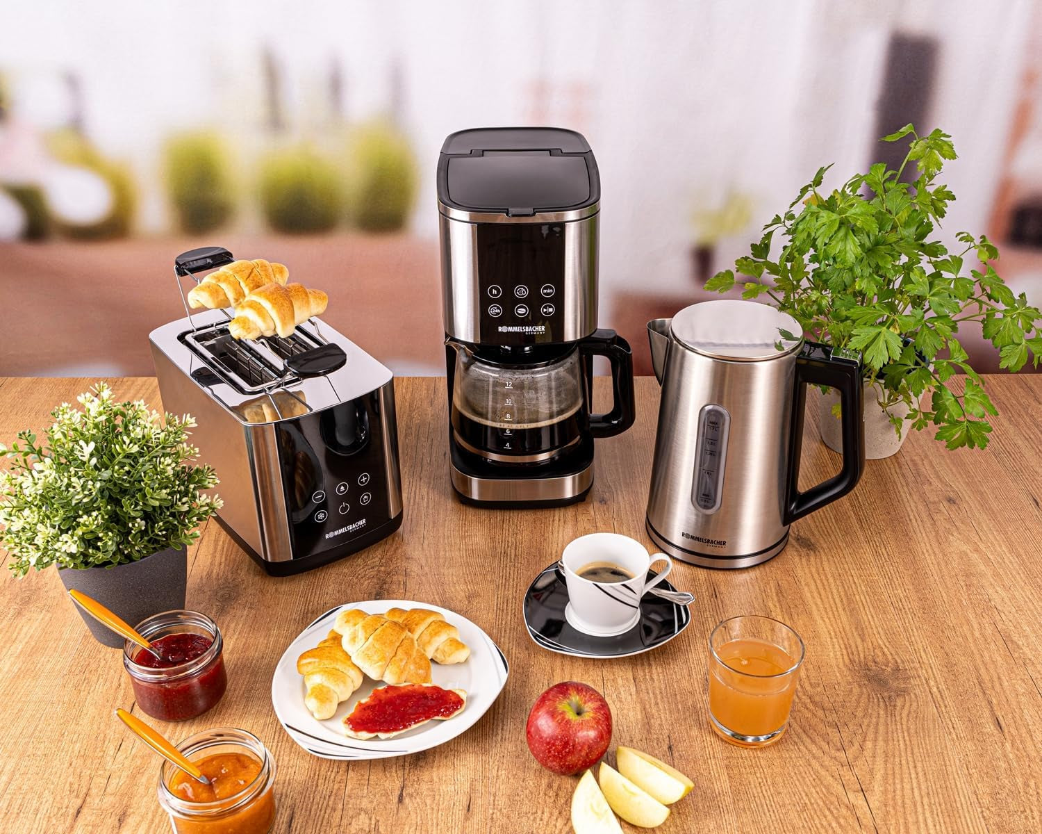 Macchina per caffè espresso con filtro Rommelsbacher FKM 1000 - serbatoio dell'acqua da 1,5 litri per 12 tazze di caffè, caraffa in vetro, avvio ritardato, funzione di mantenimento in caldo, funzione aroma, portafiltro rimovibile 1x4