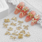50 Pezzi 3D Fiocco Oro Charms Per Unghie Farfalla Nail Art Charms Legierung Bogen Nagel Charms Nägel Zubehör Schleife Nagelschmuck Metall Schleifen Schmetterling Nageldesign Nagelanhänger Nailart Strasssteine