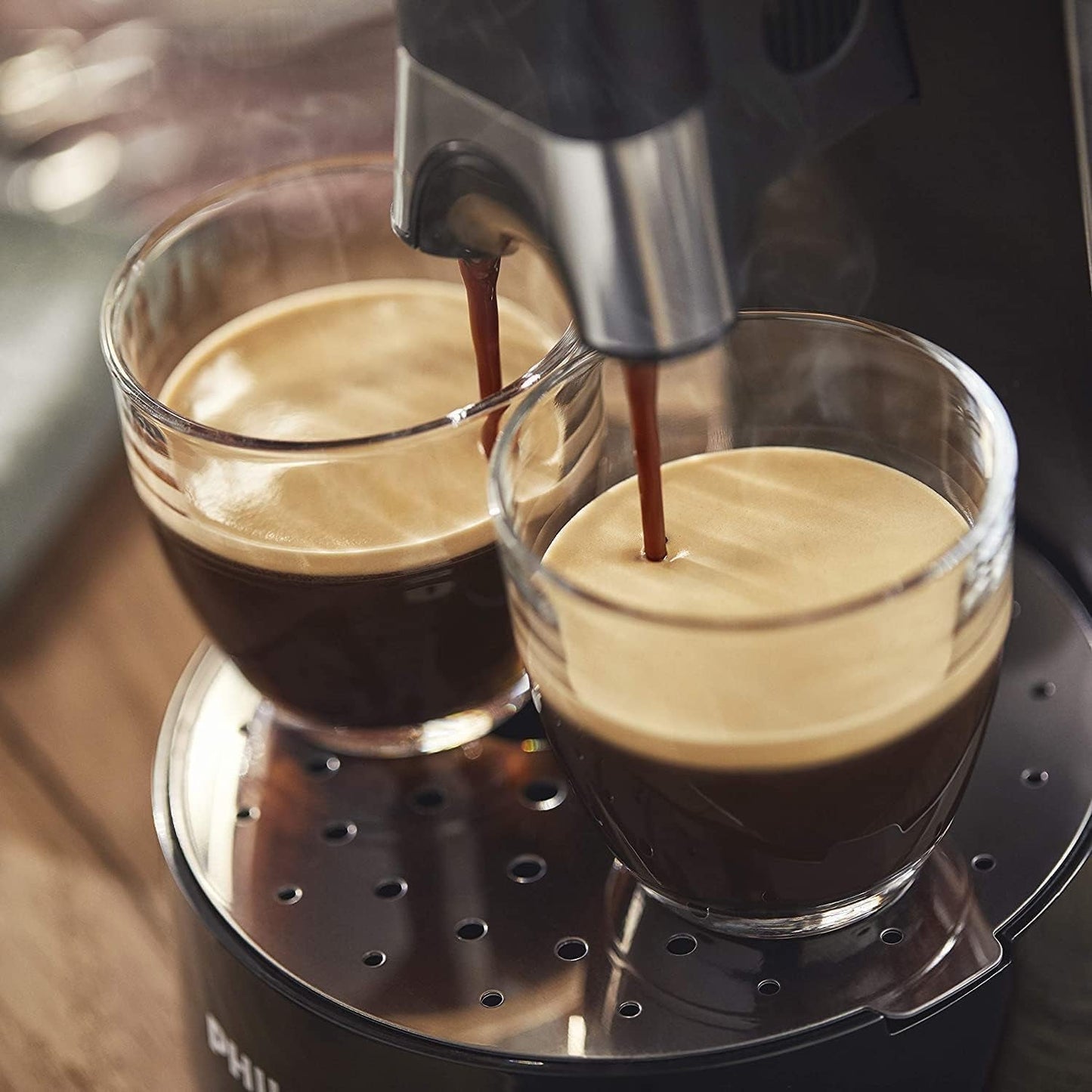 Macchina per caffè espresso a capsule PHILIPS Senseo Select con selezione dell'intensità del caffè e funzione memory, realizzata in plastica riciclata, colore: nero (CSA240/60)