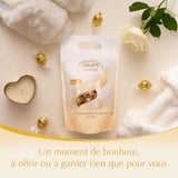 Palline di cioccolato bianco LINDOR, 1 kg e LINDOR | Busta richiudibile da 1 kg | ca. 80 palline di cioccolato al latte con ripieno di menta | Confezione sfusa, regalo pralinato, regalo cioccolato