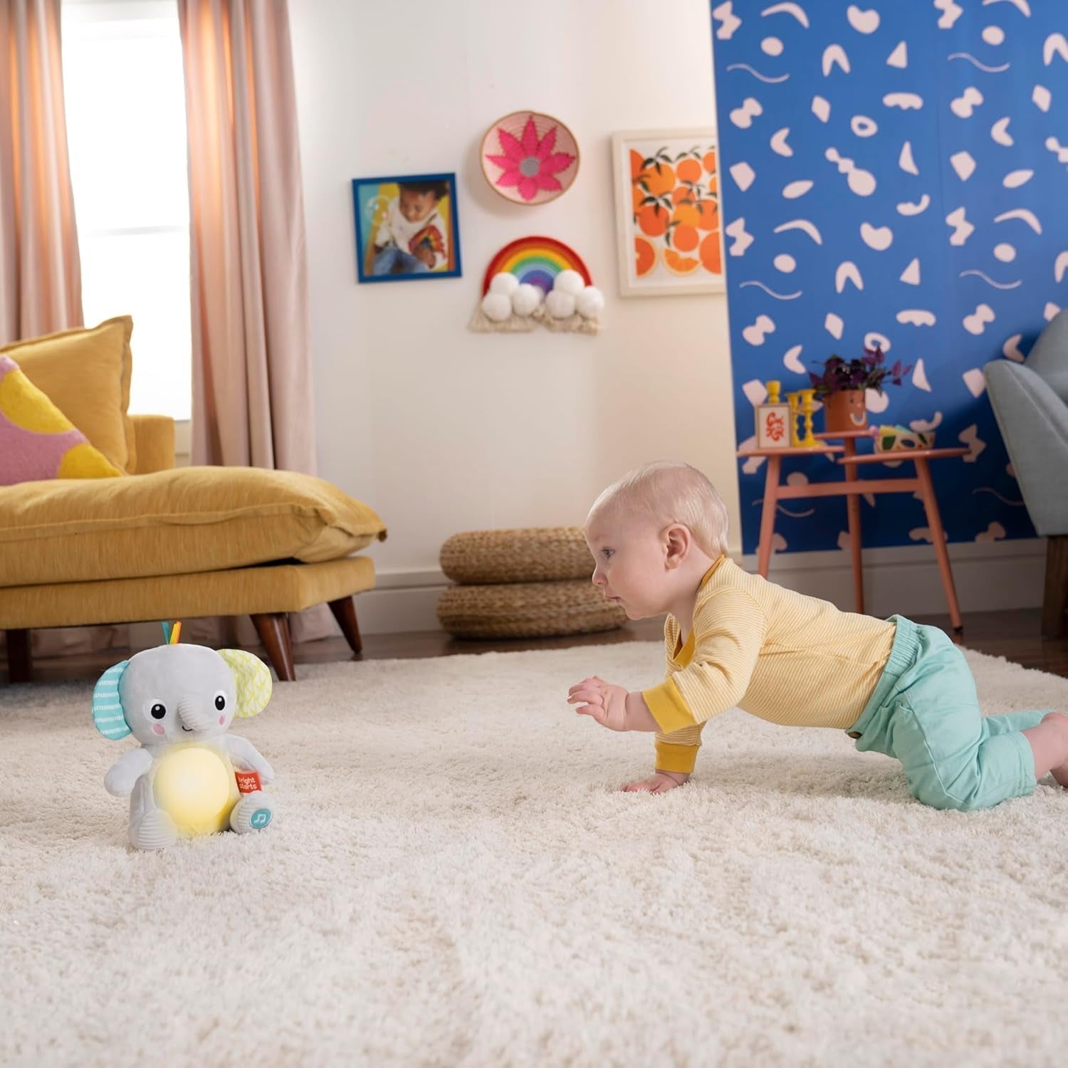 Bright Starts, Elefantino Hug-a-bye con luci, canzoni, texture diverse e altro, multicolore Toys Bebe Naty Shop