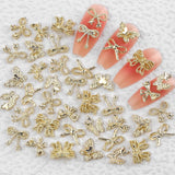 50 Pezzi 3D Fiocco Oro Charms Per Unghie Farfalla Nail Art Charms Legierung Bogen Nagel Charms Nägel Zubehör Schleife Nagelschmuck Metall Schleifen Schmetterling Nageldesign Nagelanhänger Nailart Strasssteine