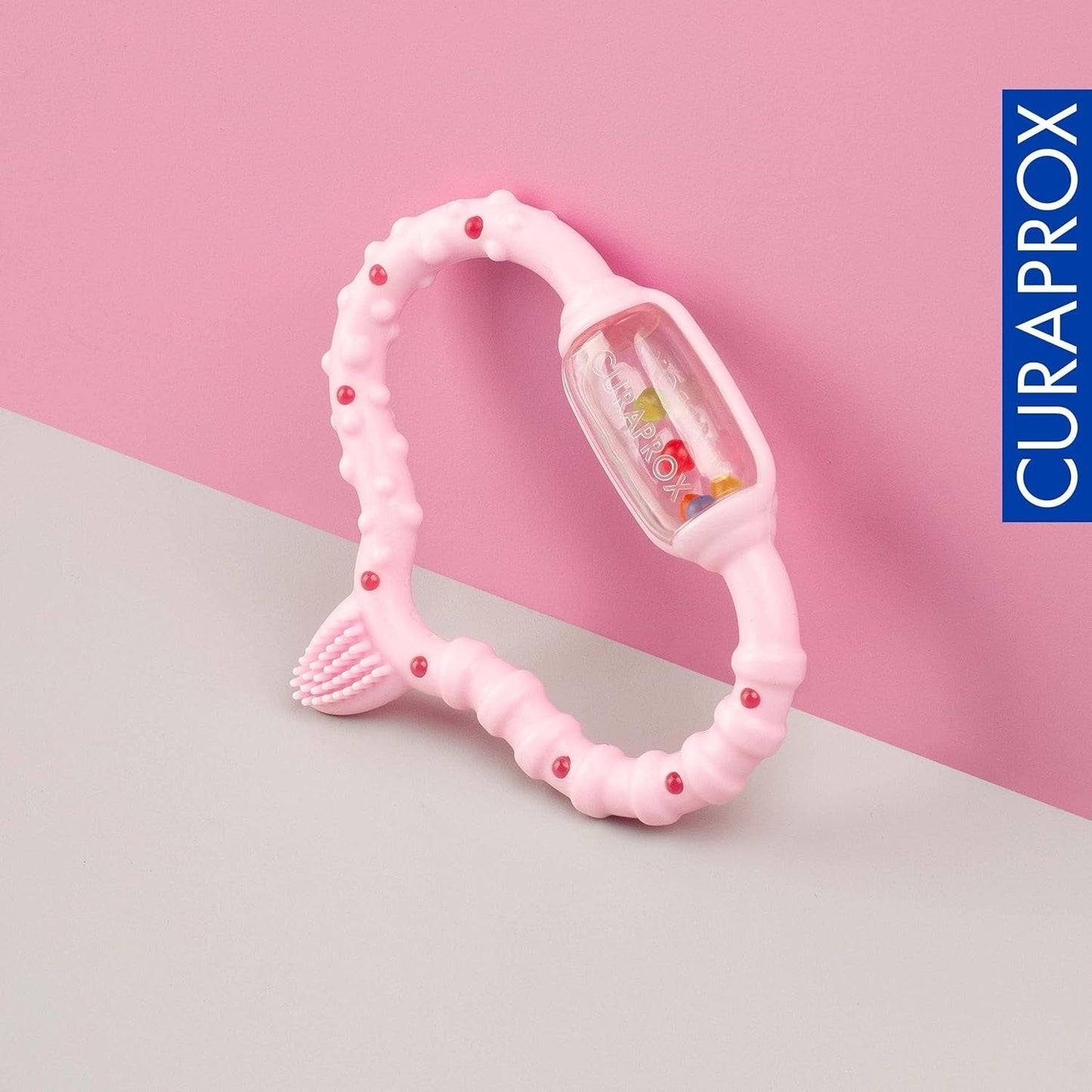 Anello da dentizione Curaprox per neonati - Per bambini da 0 a 24 mesi/Allevia il dolore dei denti e promuove le abilità motorie | Senza BPA, Rosa, con spazzolino da allenamento/Prodotto in Svizzera