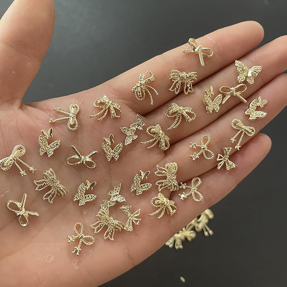 50 Pezzi 3D Fiocco Oro Charms Per Unghie Farfalla Nail Art Charms Legierung Bogen Nagel Charms Nägel Zubehör Schleife Nagelschmuck Metall Schleifen Schmetterling Nageldesign Nagelanhänger Nailart Strasssteine