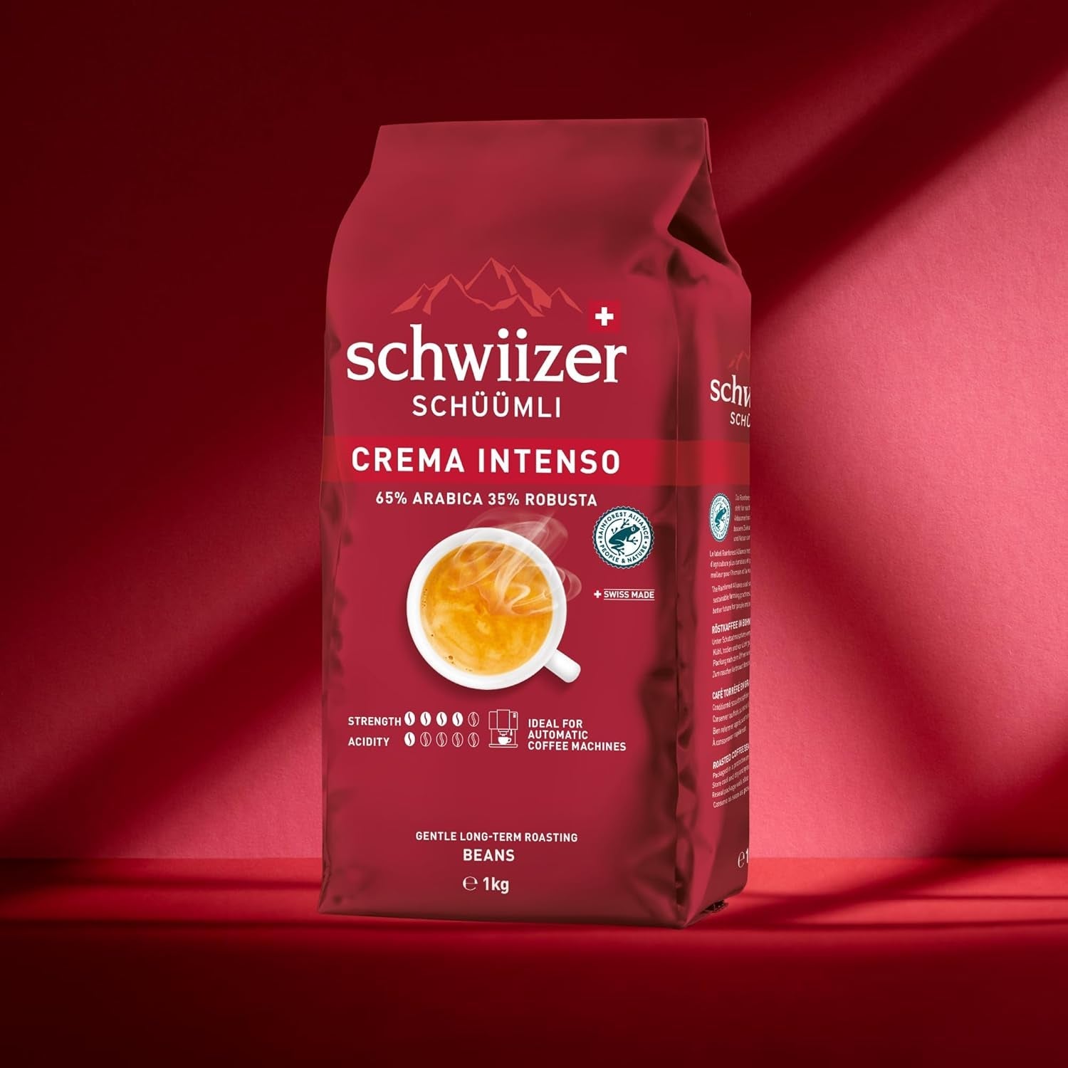 Schwiizer Schüümli Intenso, caffè Arabica/Robusta in grani, corposo e intenso, ideale per macchine espresso automatiche, forza 4/5, tostatura media, Rainforest Alliance, 1kg