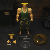 Jada Toys Street Fighter Figure Guile (15 cm) - Street Fighter 2: The Final Challengers Action Figure Mobili da Collezione con Testa Alternata, Mani e Accessori, Action Figures da 13 Anni in su Naty Shop