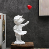 Cute Balloon Girl Scultura in resina Decorazioni per la casa Statua Banksy Cuore rosso Ragazza Palloncino Figura Scultura di arte moderna per tavolo Scaffale Decor Statue e sculture Naty Shop Palloncino bianco