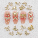 50 Pezzi 3D Fiocco Oro Charms Per Unghie Farfalla Nail Art Charms Legierung Bogen Nagel Charms Nägel Zubehör Schleife Nagelschmuck Metall Schleifen Schmetterling Nageldesign Nagelanhänger Nailart Strasssteine